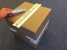 Measure cardboard and cut