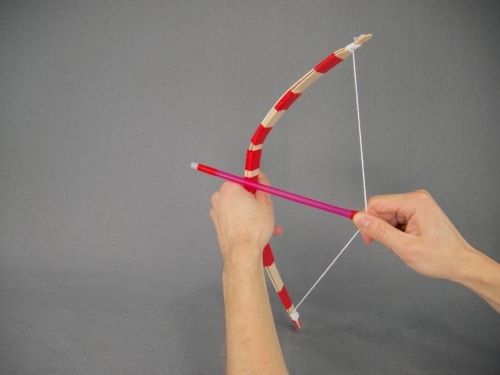 Pull back on your DIY craft stick bow and fire by simply letting go of the arrow! No need to push the bow forward.