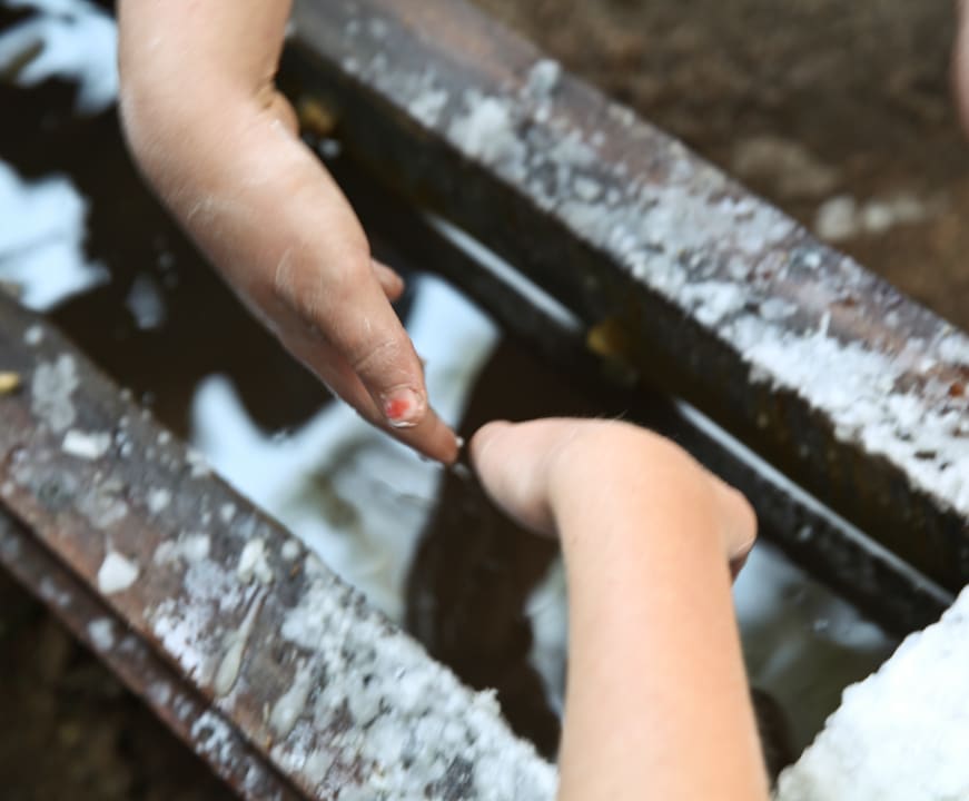 Dipping hands in wax