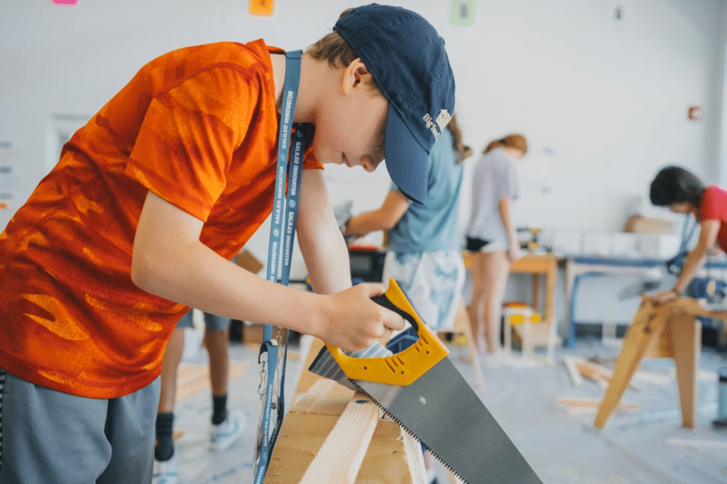 Boy in woodworking class